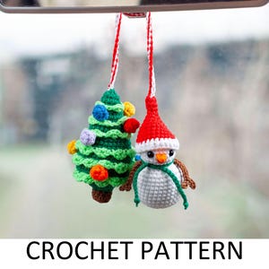 May include: Crochet pattern for a snowman and a Christmas tree ornament. The snowman is white with a red hat and a green scarf. The Christmas tree is green with colorful ornaments.