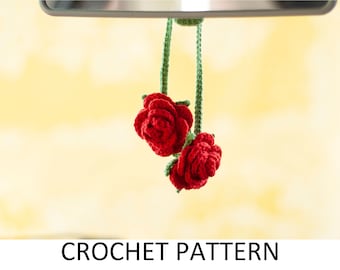 May include: Crochet pattern for a red rose car air freshener. The rose is made with red yarn and green yarn for the stem and leaves.