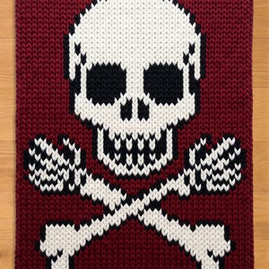 Skull With Hands Finger Knitting Pattern. Halloween Chunky Knit Blanket Pattern