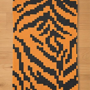 Patrón para tejer a mano con estampado de tigre. Patrón para manta de punto de chenilla gruesa. Animal de safari africano.