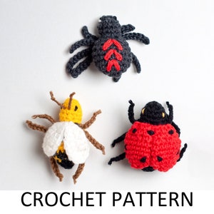 May include: Crochet pattern for a black spider, a yellow and white bee, and a red ladybug.