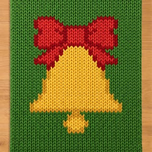 May include: A rectangular green knitted blanket featuring a central graphic design of a yellow bell topped with a large red bow. The knit pattern is consistent throughout the piece, showcasing a clear contrast between the green, yellow, and red yarn.