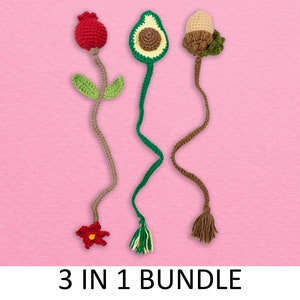 May include: A set of three crocheted bookmarks, each featuring a different fruit: a red rose, a green avocado, and a brown acorn. The bookmarks are all attached to long brown strings with tassels at the bottom. The text "3 IN 1 BUNDLE" is printed below the bookmarks.