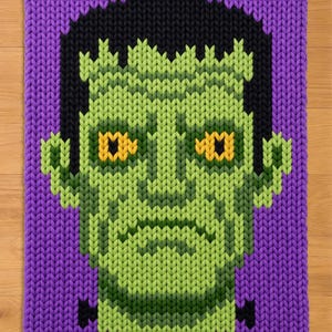 Frankenstein-Monster-Fingerstrickmuster. Halloween-Deckenmuster (grob gestrickt).