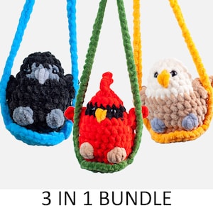 May include: Three crocheted plush birds hanging on colorful yarn swings. The birds are a black crow, a red cardinal, and a brown and white eagle. The text "3 IN 1 BUNDLE" is below the birds.