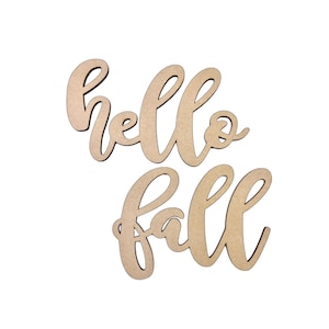 May include: Wooden cutouts spelling "hello fall" in a cursive font. The letters are a light brown color and are unpainted. The words are separate and can be arranged as desired. Perfect for fall-themed crafts and home decor.