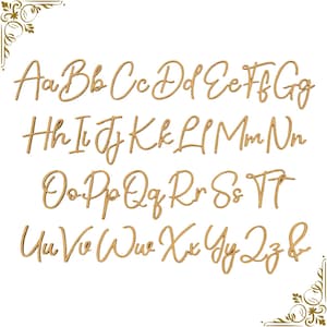 May include: Wooden cursive alphabet letters in both uppercase and lowercase, arranged in rows. The letters are in a light brown color and are displayed against a white background. Decorative gold flourishes are in the corners.