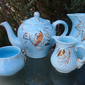 Wade Pottery1950s Teapot, Sugar Bowl, Creamer, And Pitcher Set