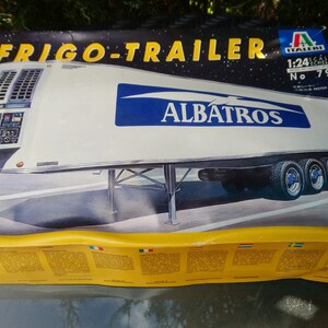 May include: A model kit box for a Frigo-Trailer, featuring a white refrigerated trailer with the blue "ALBATROS" logo. The box is yellow and has the number 791. The scale is 1:24.