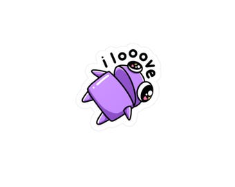 May include: A purple cartoon sticker featuring a stylized creature with large eyes and small legs. The sticker has the words "i love" in black text above the creature.