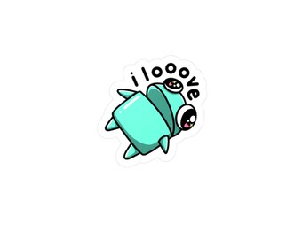 May include: A sticker featuring a cartoonish, light teal creature with large eyes and small antennae. The text "i love" is above the creature in black, rounded letters. The creature has a cute, playful design.