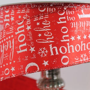 Weihnachtliches Band 50m festlich, 2.5"g ho ho ho. Fröhlich, skurril.