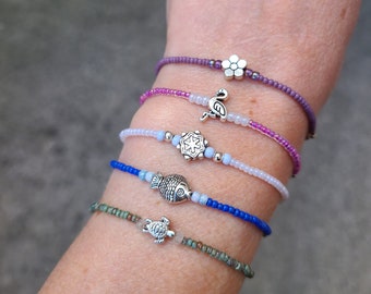 Adorable Beaded Bracelet; Handmade; Silver Center Bead, Glass Seed Beads & Silver Spacers and Findings