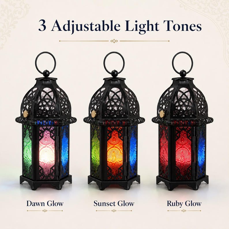 May include: Three black metal lanterns with intricate cut-out patterns and hanging rings. Each lantern displays different colored glass panels and internal light settings labeled as Dawn Glow, Sunset Glow, and Ruby Glow. Text reads 3 Adjustable Light Tones.