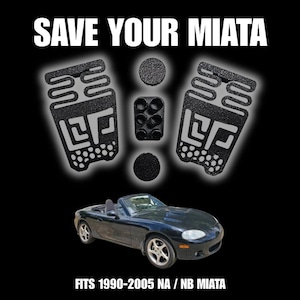 Könnte beinhalten: Ein Set aus drei Keramikbechern mit gesprenkelter, matter Oberfläche. Die Becher sind in Creme-, Hellgrau- und Dunkelgrautönen gehalten. Jeder Becher hat ein schlichtes, minimalistisches Design und einen abgerundeten Henkel.