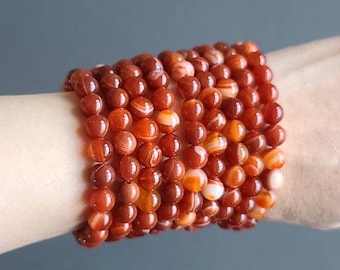 Bracelet en cornaline : pierre précieuse énergisante pour chakra racine