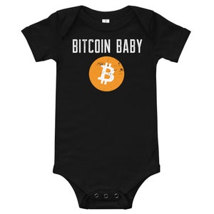 May include: Black baby onesie with the text "Bitcoin Baby" and a distressed orange circle with a white Bitcoin symbol.