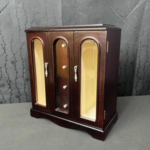 Vintage wooden jewelry box with mirror and drawers Vintage wooden jewelry organizer cabinet
