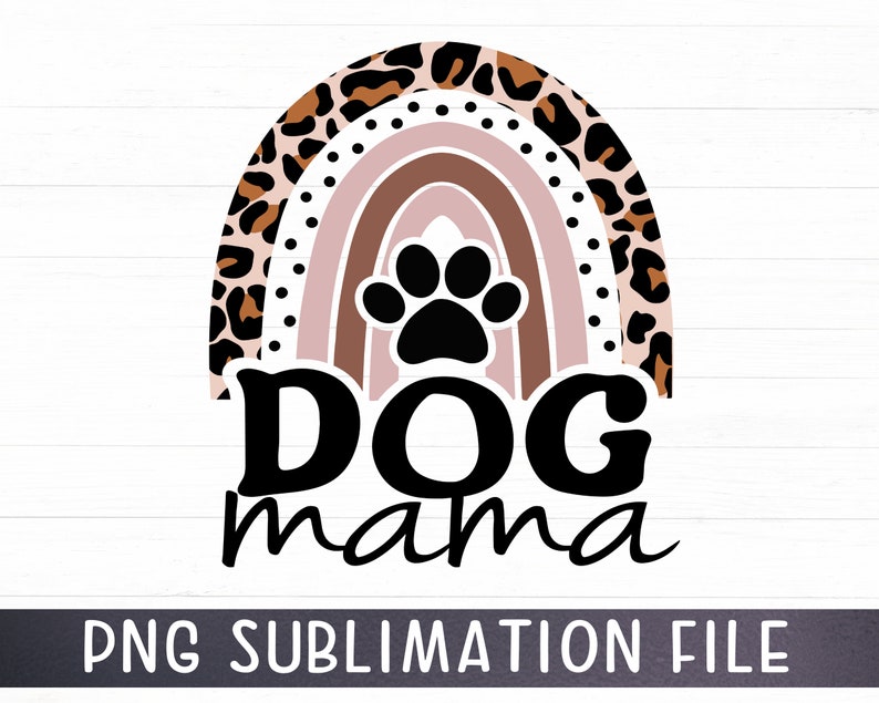 May include: A digital design featuring a rainbow with a paw print in the center. The rainbow is made up of brown, pink, and white stripes. The rainbow is surrounded by a leopard print pattern. The text "Dog mama" is written below the rainbow.