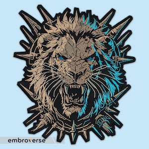 May include: An embroidered patch featuring a lion's head with blue eyes. The lion is surrounded by a circle of sharp spikes, all in black and brown.