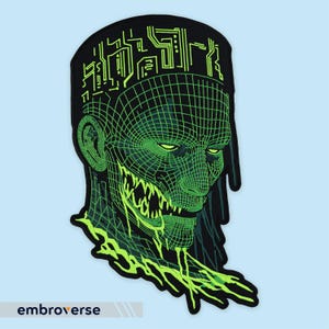 May include: Black patch featuring a green wireframe design of a face with glowing eyes and a jagged mouth. The top of the patch has a circuit board design. The word "embroverse" is at the bottom.