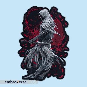 May include: Embroidered patch depicting a hooded figure in a flowing white robe, holding a dagger. The figure is surrounded by red and black feathers, creating a dramatic and mystical scene.