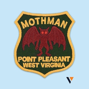 May include: Embroidered patch featuring the Mothman, a red winged creature with glowing eyes. The patch is shield-shaped with a green background and yellow border. Text includes "MOTHMAN" and "POINT PLEASANT WEST VIRGINIA."