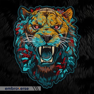 Peut inclure: Un patch brodé coloré représentant un tigre rugissant avec un motif de couleur bleu, rouge et jaune. Le tigre est entouré d'un motif floral.
