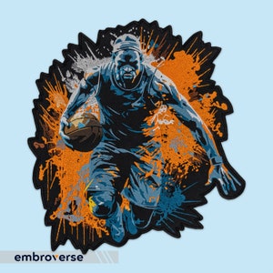 May include: An embroidered patch depicting a basketball player dribbling a ball. The player is wearing a black jersey with orange and blue accents. The background is a stylised orange and blue splatter design.