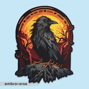 May include: A black raven with red eyes perched on a branch in front of a large orange and yellow sun. The raven is surrounded by dark trees and a circular frame with a design.