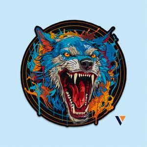 May include: A circular embroidered patch featuring a snarling wolf head with blue fur, sharp white teeth, and glowing orange eyes. The design is accented with vibrant orange and blue paint splatter effects against a black background with a stitched border.