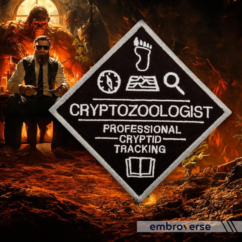 May include: Black and white embroidered patch in a diamond shape. The patch reads "Cryptozoologist Professional Cryptid Tracking" and features a compass, footprint, magnifying glass, and book icon.