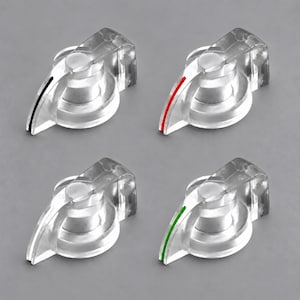 May include: Four clear plastic control knobs with a tiered circular base and a protruding pointer. Each knob features a thin indicator line on the pointer, colored black, red, white, and green respectively, for use on electronic equipment.