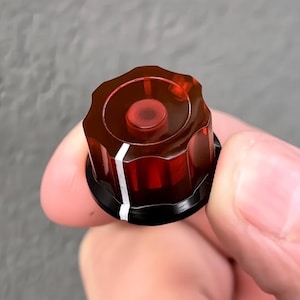 Perilla giratoria transparente roja/negra opaca