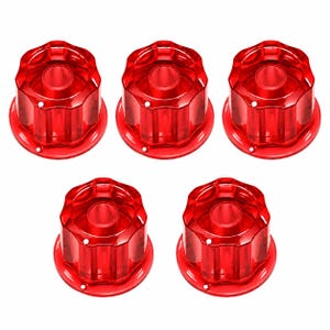 May include: Five identical red translucent knobs with a faceted, multi-sided exterior design. Each knob features a circular opening in the center and a flat, circular base with a small hole near the edge, showcasing a glossy, smooth finish.