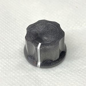 Bouton rotatif argenté/gris