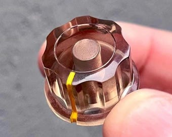 Transparenter brauner Drehknopf