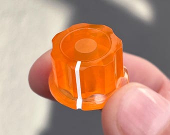 Perilla giratoria naranja transparente