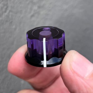 Transparent Lila / Opak Schwarz Drehknopf