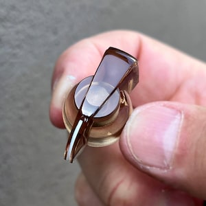 Bouton pointeur Tête de poulet - Marron transparent