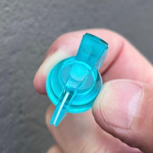 Wijzerknop kippenkop - transparant turkoois