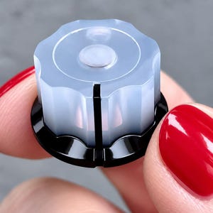 Bouton rotatif blanc transparent / noir opaque