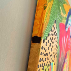 May include: A colorful abstract painting on canvas with a black, yellow, orange, green, and red color scheme. The painting features a variety of shapes and textures, including dots, lines, and swirls.