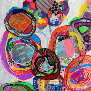 May include: Abstract painting with bright colours and bold shapes. The painting features circles, swirls, and lines in shades of pink, blue, green, yellow, orange, and red.