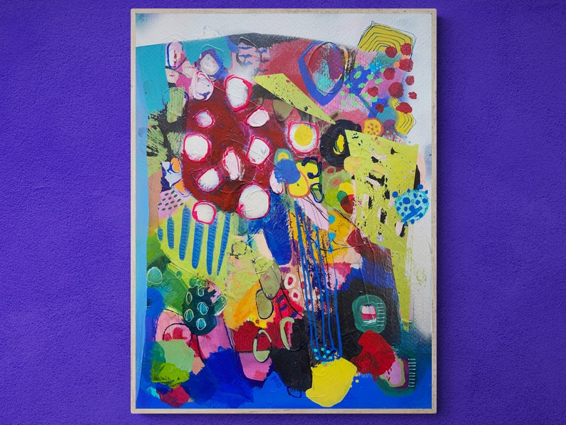 May include: Abstract painting with a colourful, layered design. The painting features a large red shape with white dots, surrounded by green, blue, yellow, and pink shapes. The painting has a textured surface and a modern style.