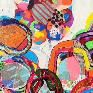 May include: Abstract painting with bright colours and bold shapes. The painting features circles, swirls, and lines in shades of red, orange, yellow, green, blue, purple, and black.