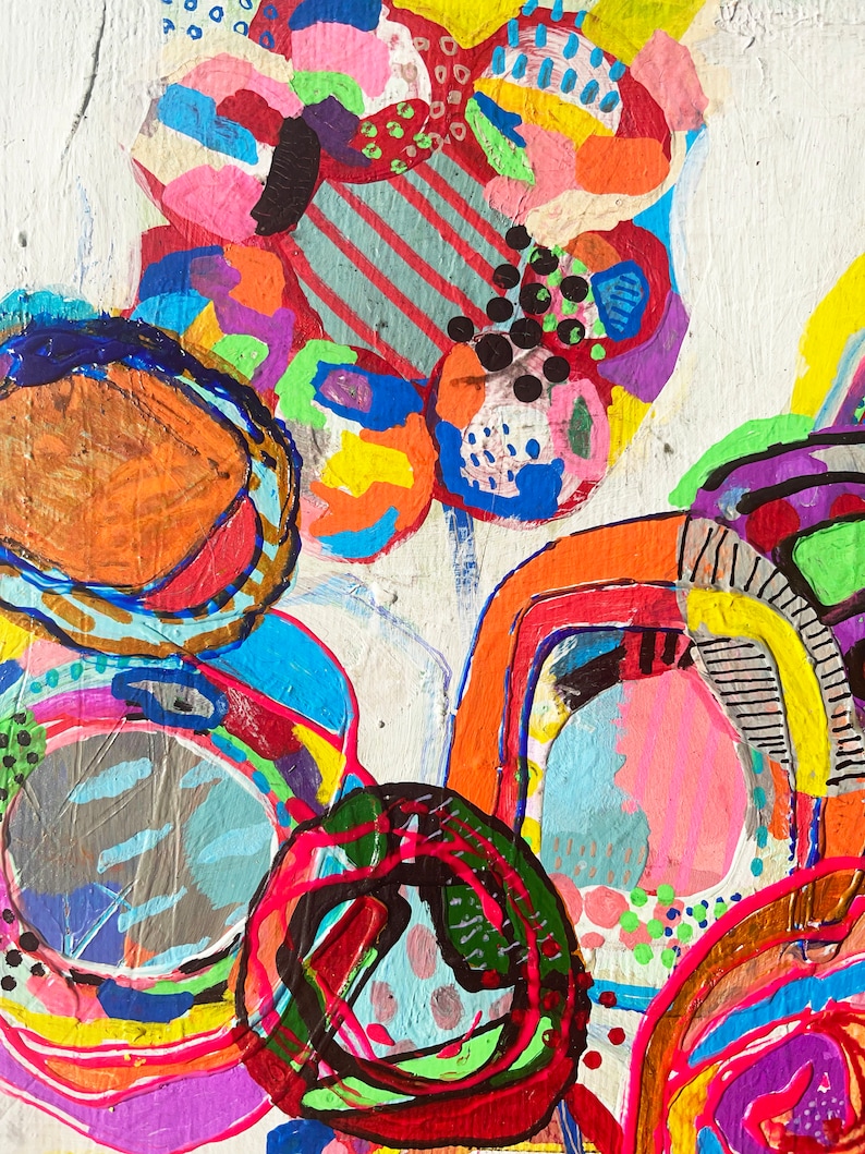 May include: Abstract painting with bright colours and bold shapes. The painting features circles, swirls, and lines in shades of red, orange, yellow, green, blue, purple, and black.