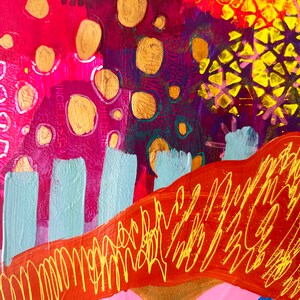 May include: Abstract painting with a red, purple, and orange background. The painting features gold circles, yellow geometric shapes, and blue and green lines.