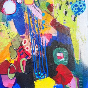 May include: Abstract painting featuring a blend of vibrant colours, including yellow, blue, red, green, and black. The painting has a textured surface and a range of shapes and lines.