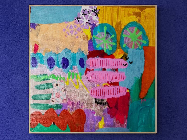 May include: Abstract painting on canvas with a colorful and textured design. The painting features a variety of shapes and colors, including pink, blue, green, yellow, and orange. The painting is framed in a wooden frame.